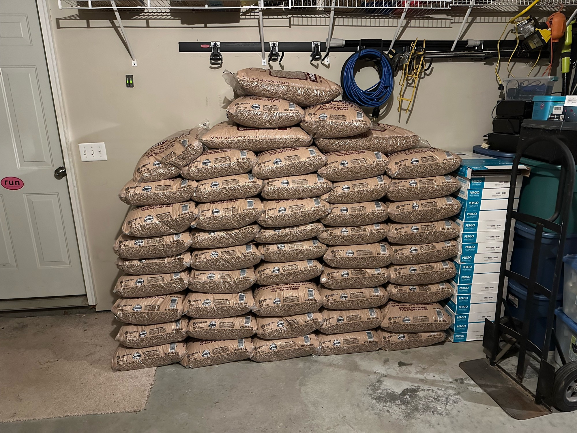 a photo of a ton of pellets stacked in my garage. 