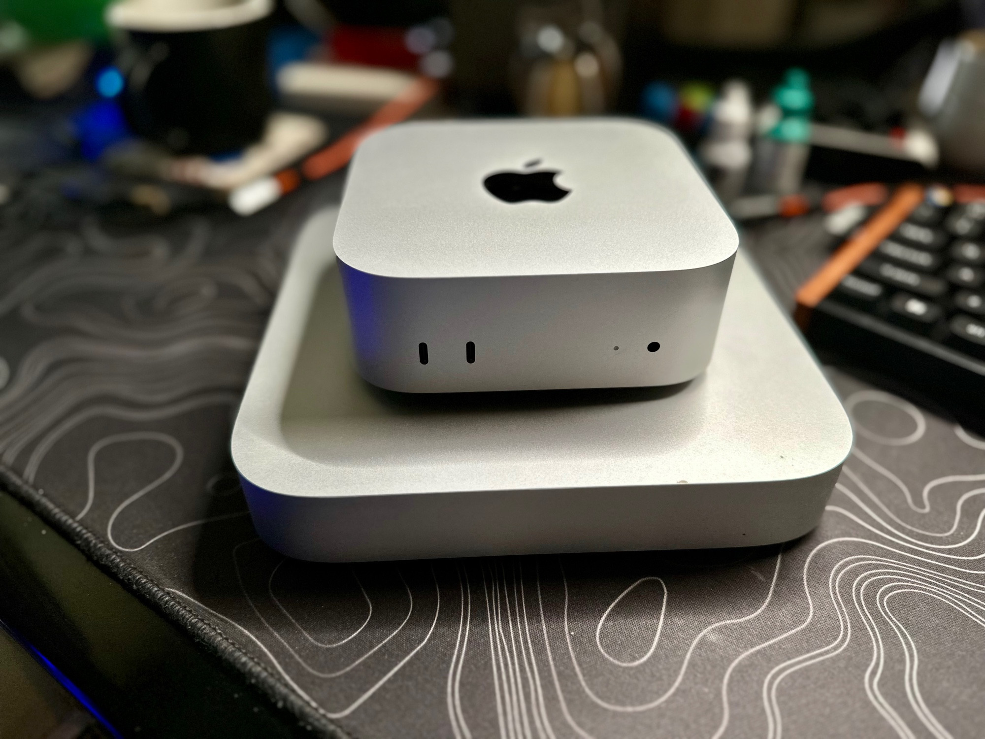 a photo of my new M4pro mac mini on top of my old M1 mac mini. 