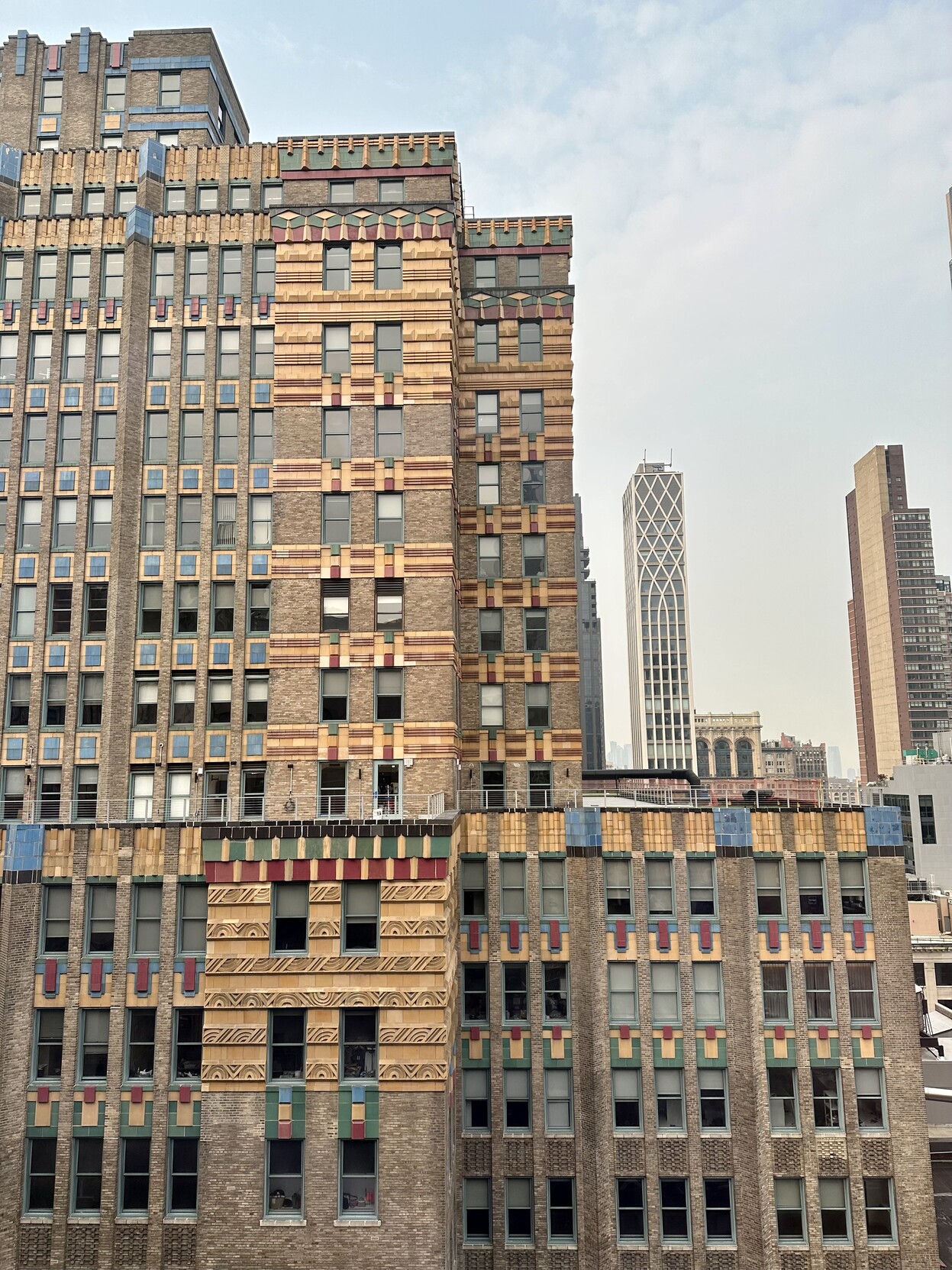 a photo of the terra cotta work at the top of the 2 park avenue building 