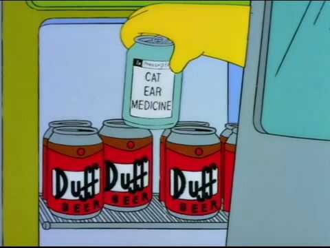 a screenshot of an episode of The Simpson where homer mistakenly grabs a can of “cat ear medicine” from the fridge instead of a Duff Beer