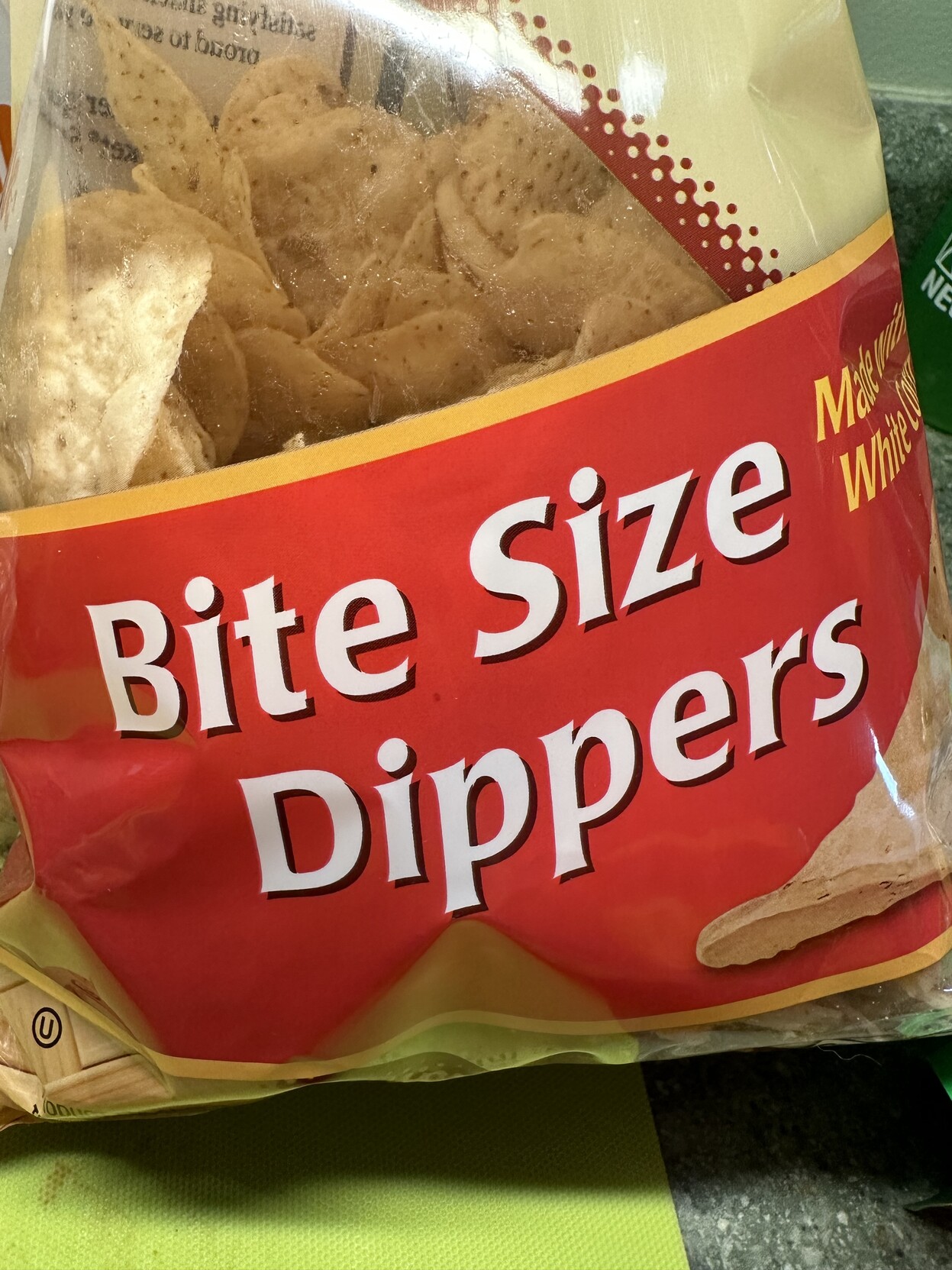 a photo of a bag of tortilla chips called “bite size dippers” 