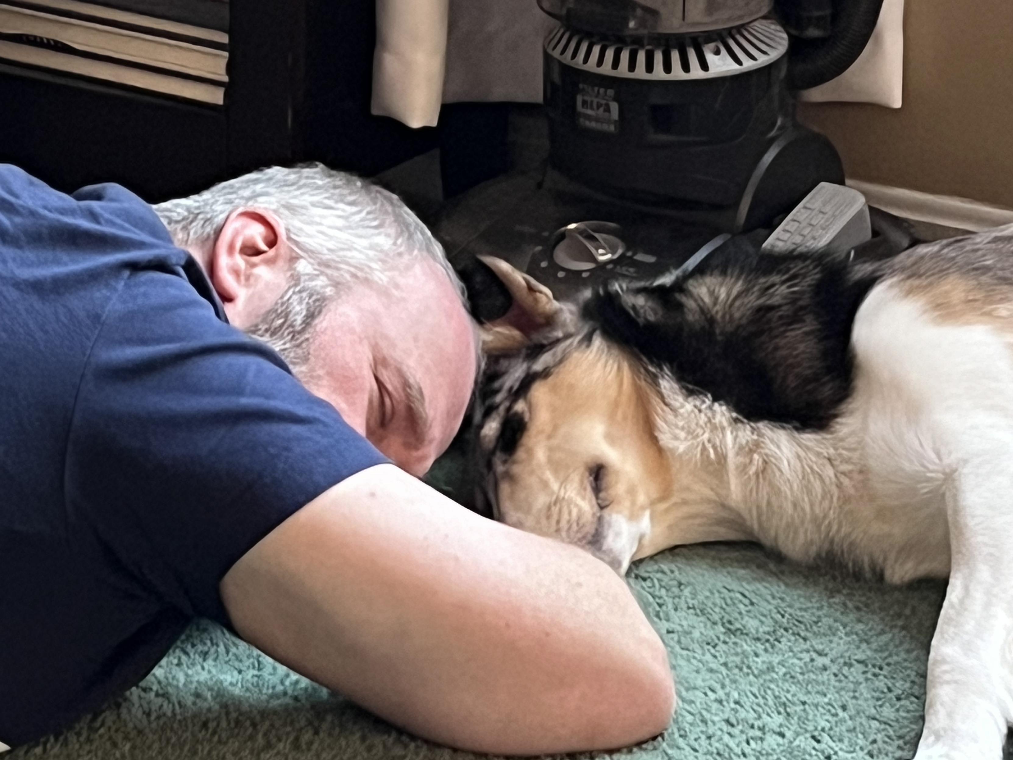 a picture of me dozing off on the floor next to my smooth collie puppy who was also dozing off. 10/10 