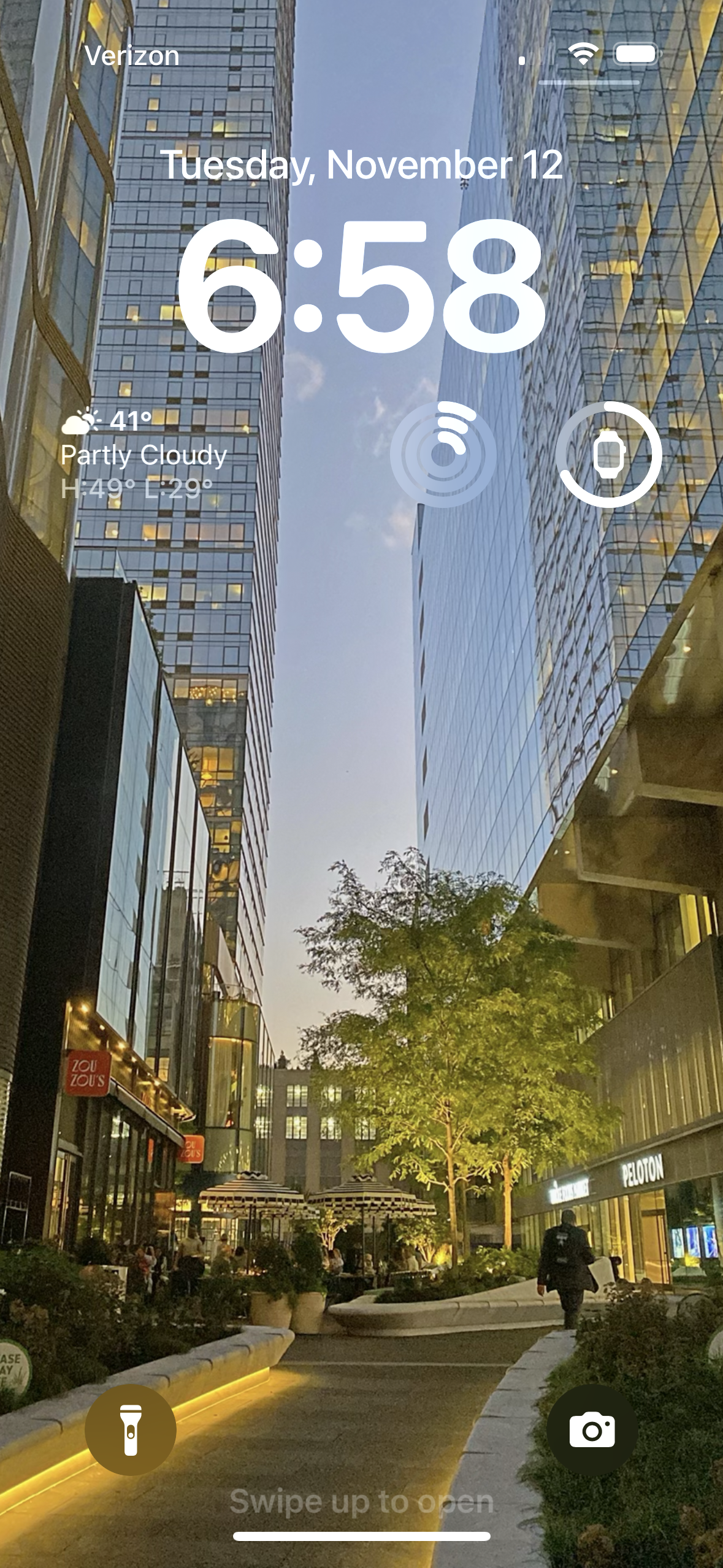 a screenshot of my lock screen with a photo from the hudson yards area of Manhattan