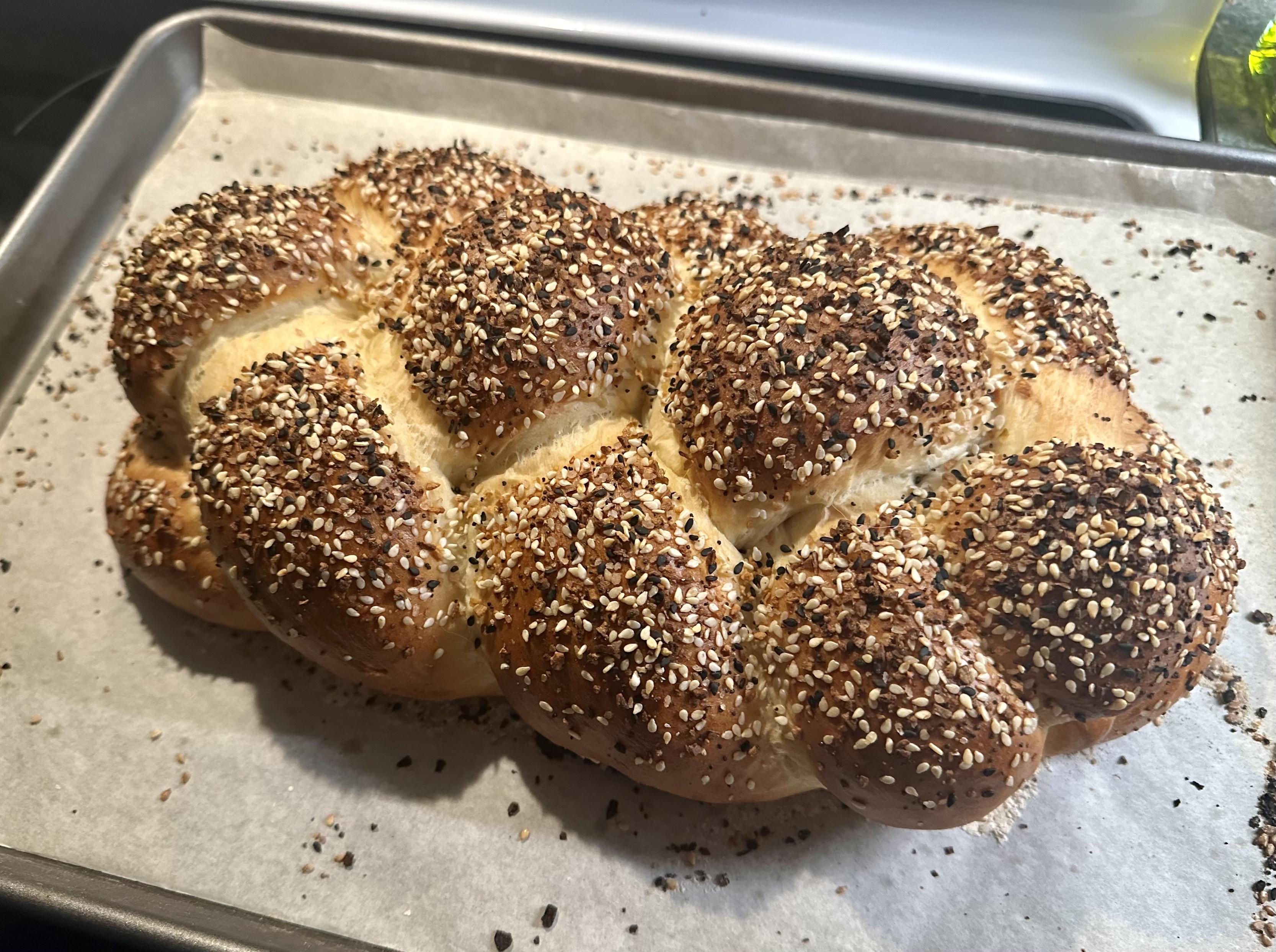 a photo of a loaf of braided everything bread