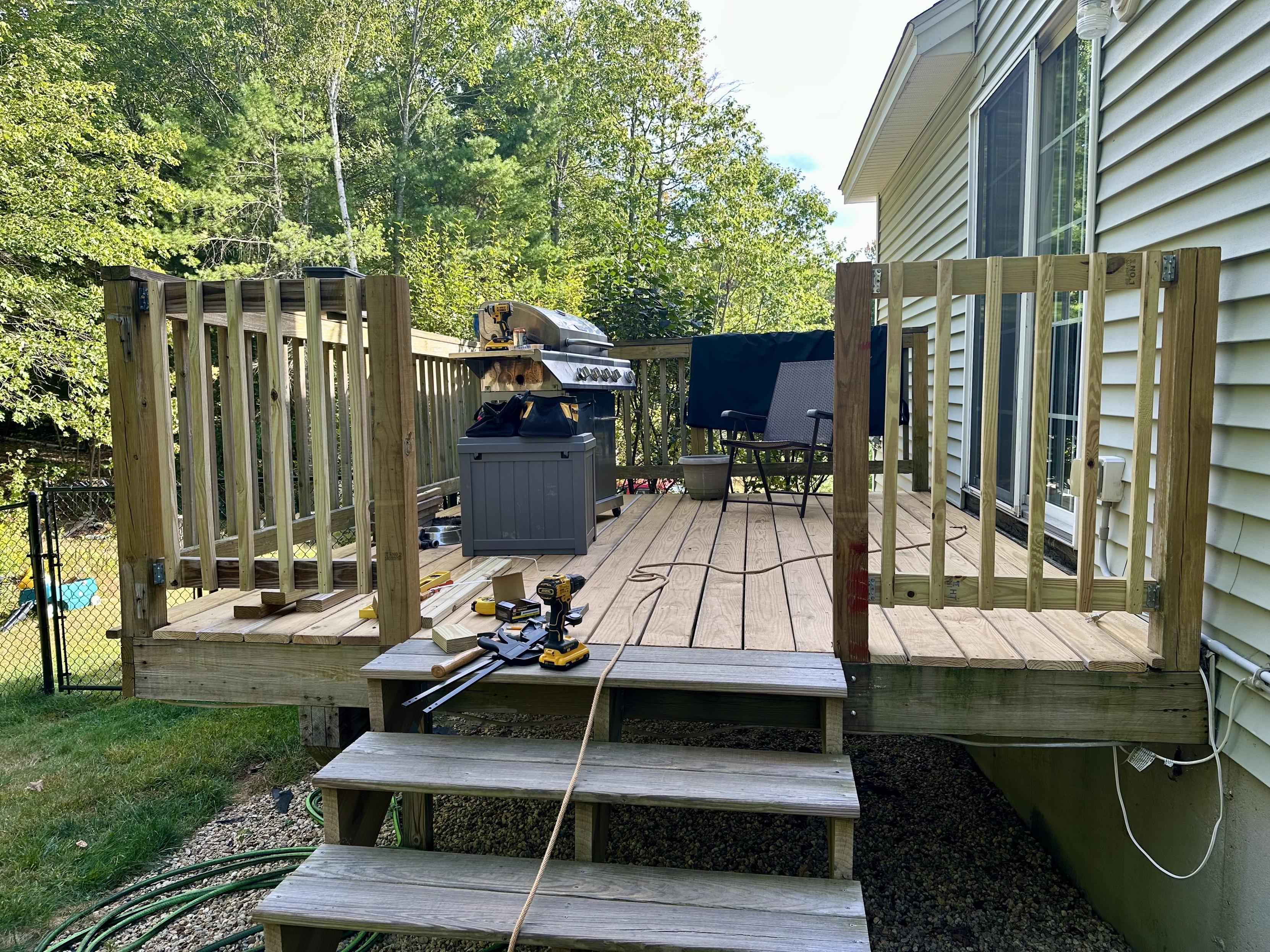 a photo of my deck and the new railing i’ve been building. 