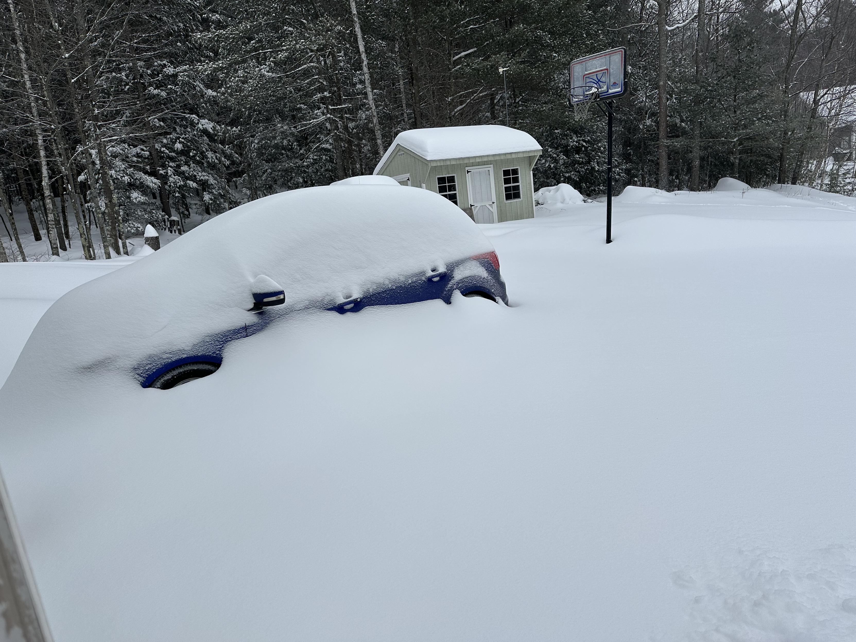 how it started - monday morning after the snowstorm, driveway and car and truck buried in snow