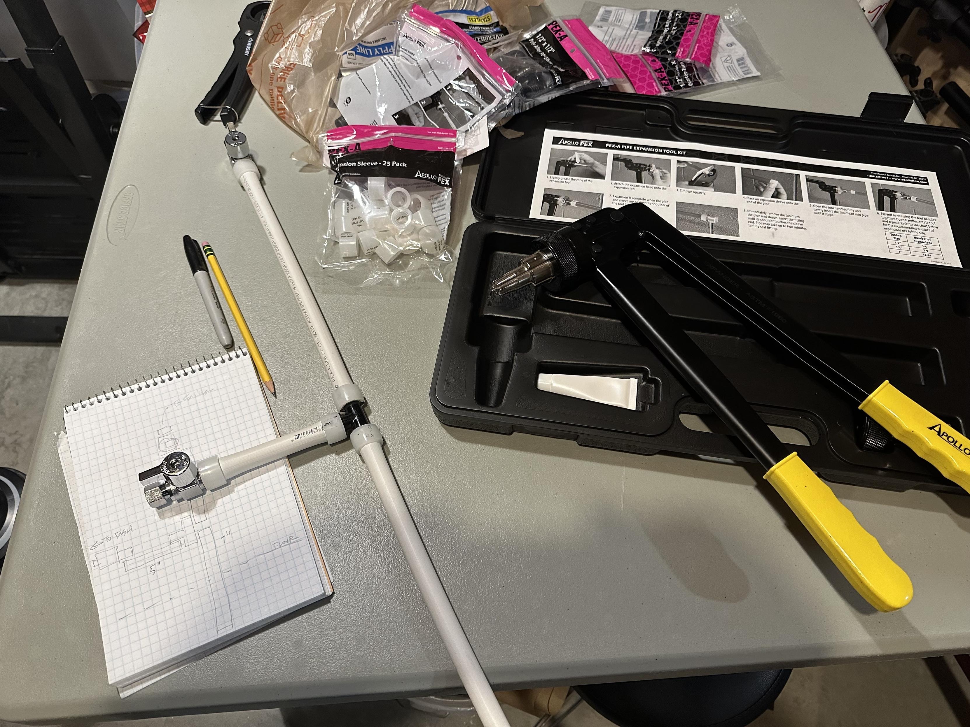 a photo of a PEX A tool and an assembled piece of plumbing that was built using the tool.