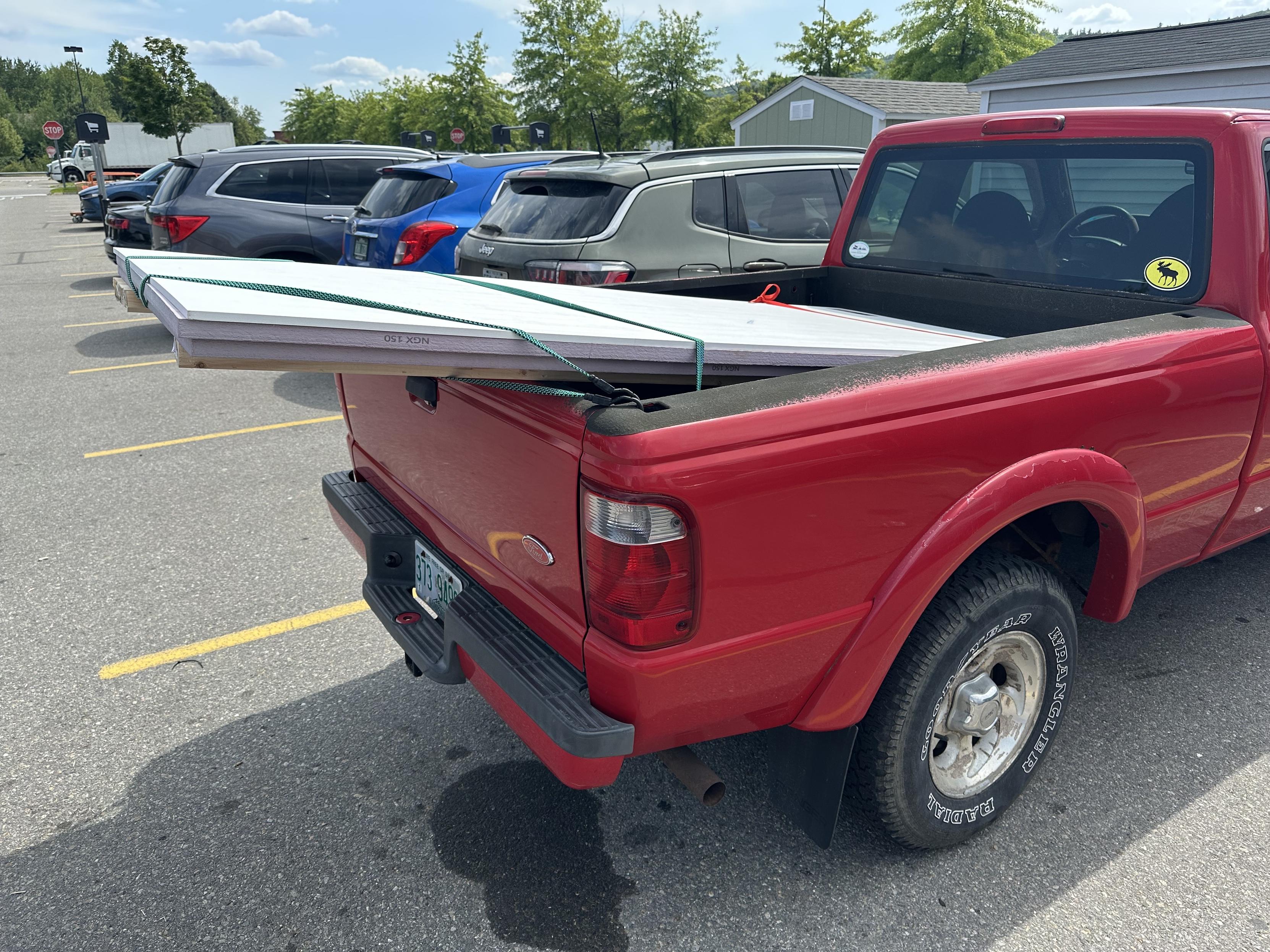 a photo of my ford ranger with various 4x8 sheet and 1x and 2x loaded into the bed.